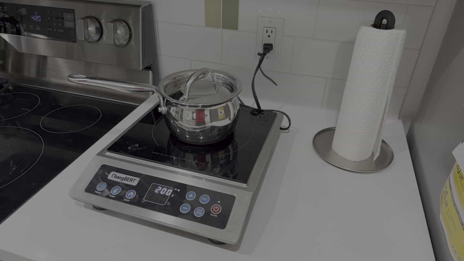 ChangBERT CIB-80 Plus portable induction cooktop with stainless-steel saucepan
